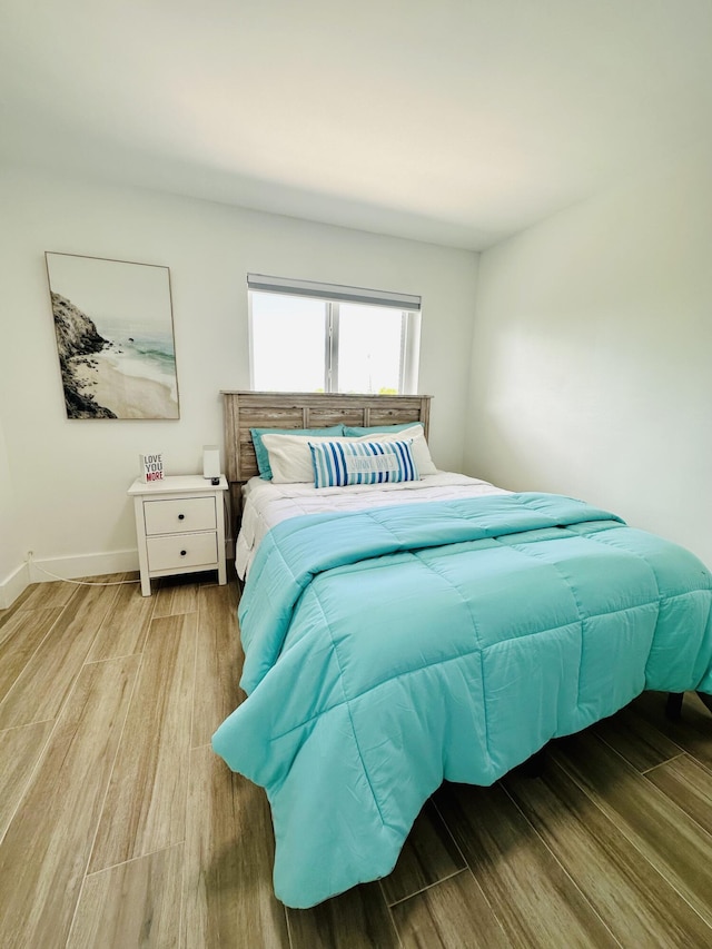 bedroom featuring light hardwood / wood-style flooring