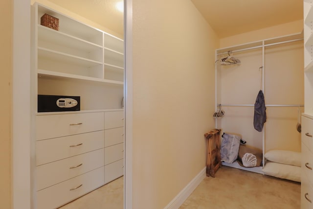 1323 Hudgins Dr, Summerland, FL 33042 - walk in closet featuring light colored carpet