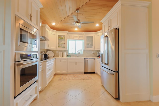 1323 Hudgins Dr, Summerland, FL 33042 - kitchen with wooden ceiling, light countertops, appliances with stainless steel finishes, and a ceiling fan