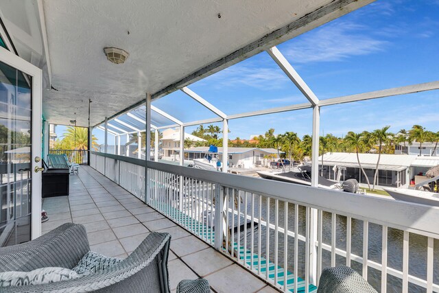 balcony with a residential view and a sunroom