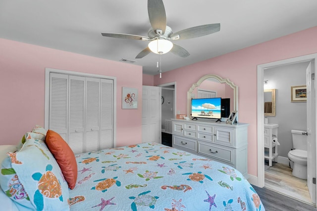 26 Corrine Pl, Key Largo, FL 33037 - bedroom featuring visible vents, a ceiling fan, wood finished floors, a closet, and connected bathroom