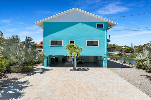 26 Corrine Pl, Key Largo, FL 33037 - exterior space with a carport and decorative driveway