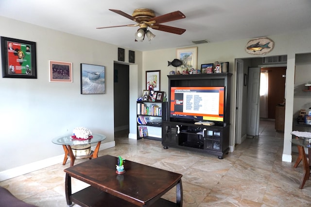 living room with ceiling fan