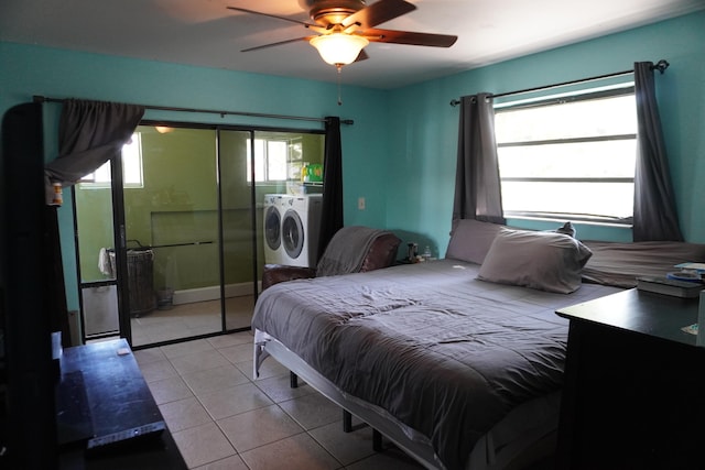 bedroom featuring washer and clothes dryer, a closet, ceiling fan, and light tile patterned flooring