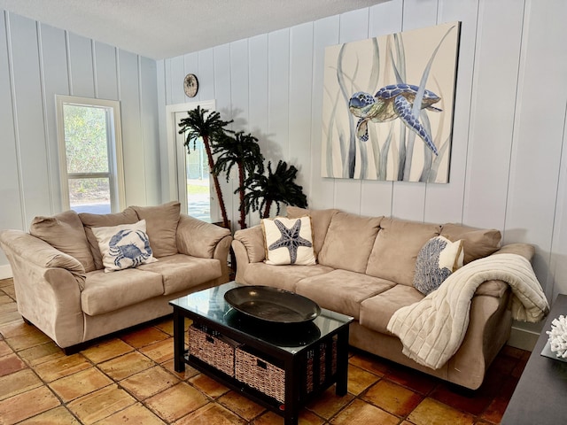 living room featuring a textured ceiling