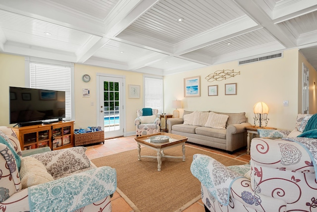 living room featuring beamed ceiling, ornamental molding, coffered ceiling, and light tile patterned floors