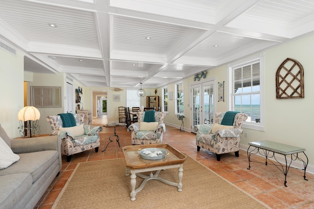 tiled living room featuring coffered ceiling, beam ceiling, ornamental molding, and french doors