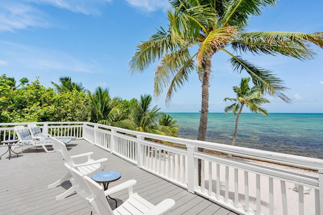 deck featuring a water view