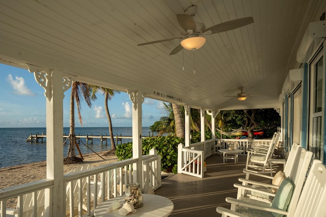 wooden deck with a water view