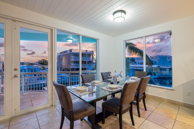 dining space with wooden ceiling