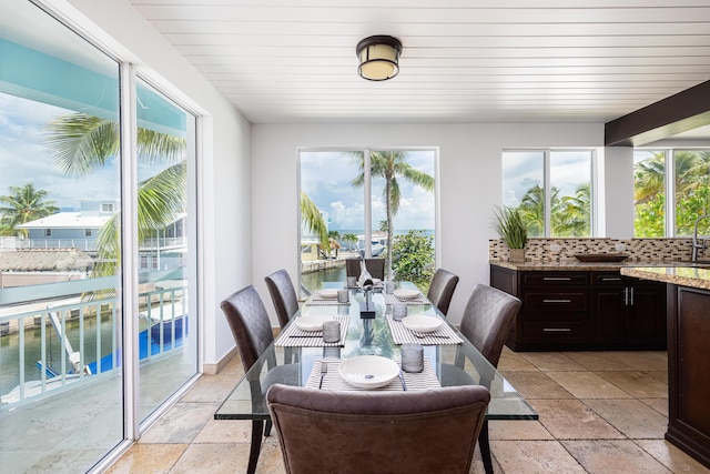 dining area with a water view