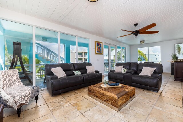 living room with wooden ceiling and ceiling fan