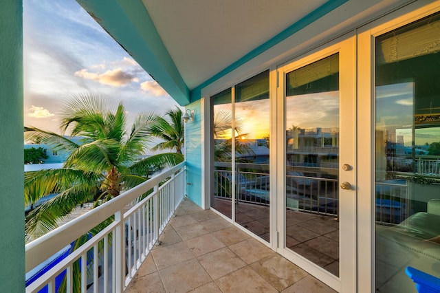 view of balcony at dusk