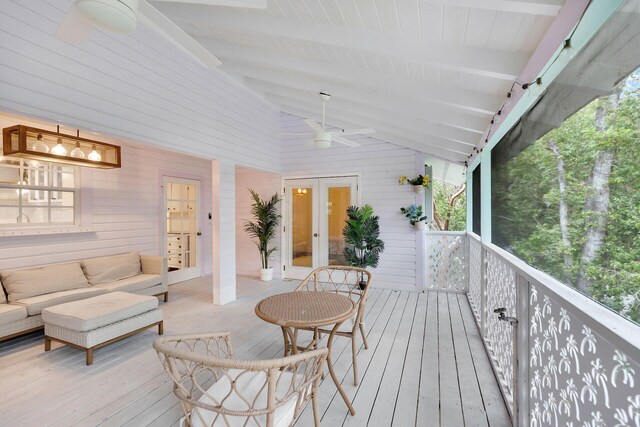71 N Bay Harbor Dr, Key Largo, FL 33037 - wooden terrace featuring french doors, a ceiling fan, and outdoor lounge area