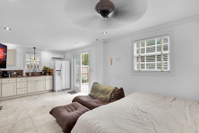 71 N Bay Harbor Dr, Key Largo, FL 33037 - bedroom featuring white fridge with ice dispenser, access to outside, crown molding, light tile patterned flooring, and recessed lighting