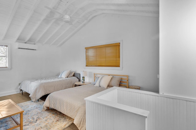 71 N Bay Harbor Dr, Key Largo, FL 33037 - bedroom with a wall unit AC, lofted ceiling, and wood finished floors