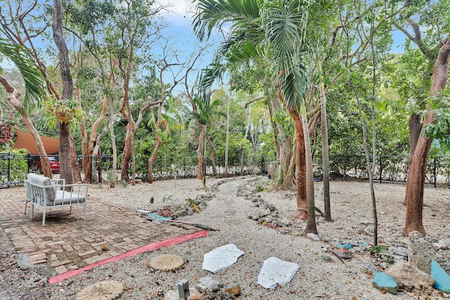 71 N Bay Harbor Dr, Key Largo, FL 33037 - fenced backyard featuring a patio