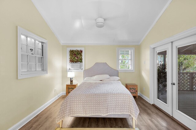 71 N Bay Harbor Dr, Key Largo, FL 33037 - bedroom with lofted ceiling, access to outside, wood finished floors, crown molding, and cooling unit