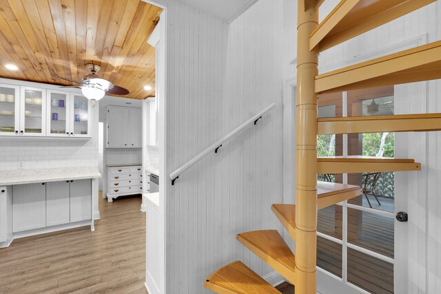 71 N Bay Harbor Dr, Key Largo, FL 33037 - staircase with wood finished floors, ceiling fan, wooden ceiling, and recessed lighting
