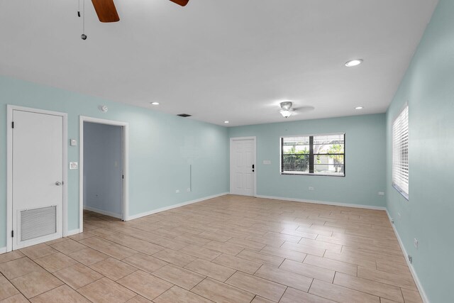 unfurnished room featuring ceiling fan