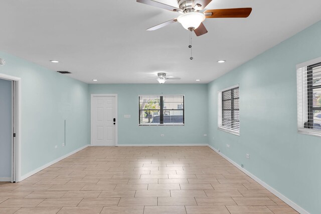 unfurnished room featuring ceiling fan