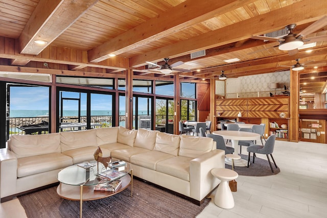 87851 Old Hwy Unit K26, Islamorada, FL 33036 - living room with ceiling fan, a wooden ceiling with exposed beams, wood finished floors, wood walls, and a water view