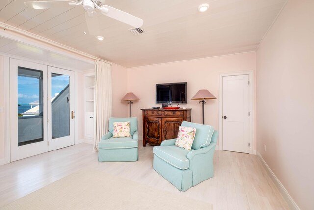 81250 Overseas Hwy Unit 5, Islamorada, FL 33036 - sitting room with french doors, ceiling fan, and light hardwood / wood-style flooring