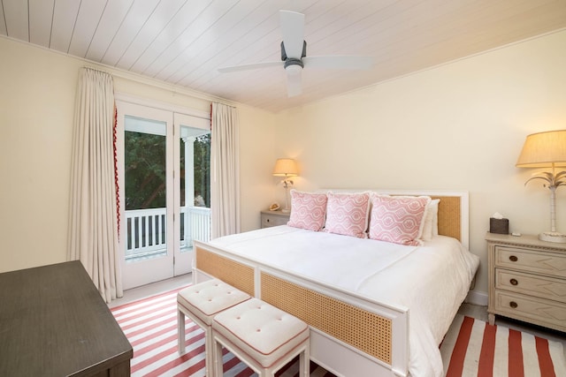 81250 Overseas Hwy Unit 5, Islamorada, FL 33036 - bedroom with ceiling fan, access to outside, and wood ceiling
