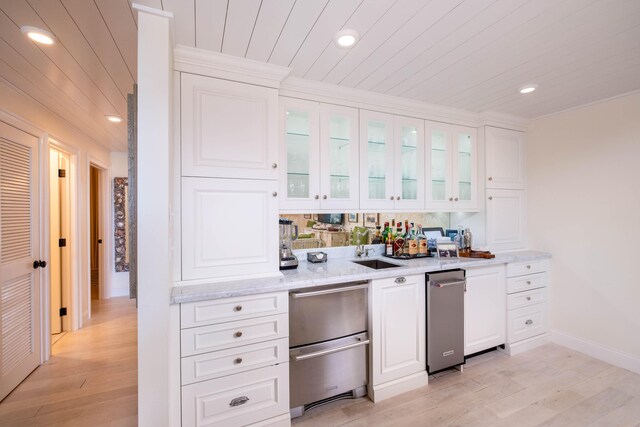 81250 Overseas Hwy Unit 5, Islamorada, FL 33036 - bar featuring white cabinetry, light stone countertops, wood ceiling, and light hardwood / wood-style floors