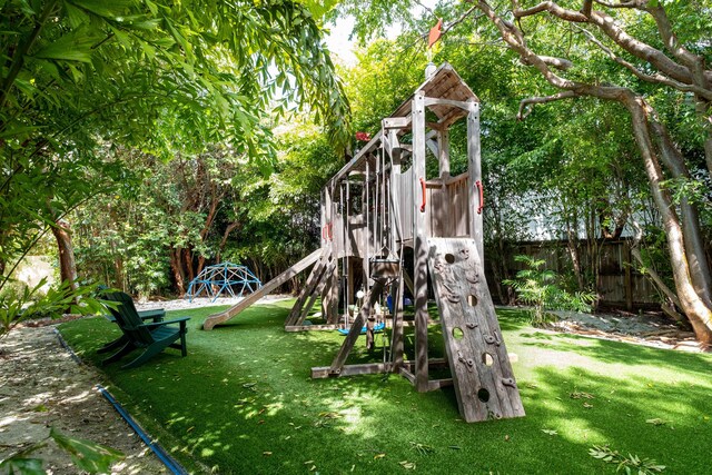 81250 Overseas Hwy Unit 5, Islamorada, FL 33036 - view of play area with a lawn