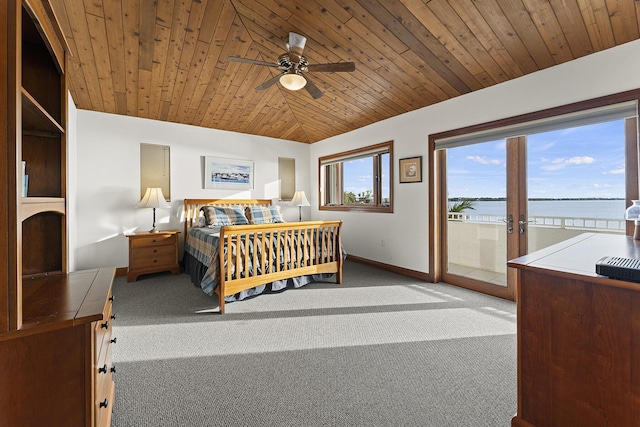 carpeted bedroom with lofted ceiling, access to outside, ceiling fan, wood ceiling, and a water view