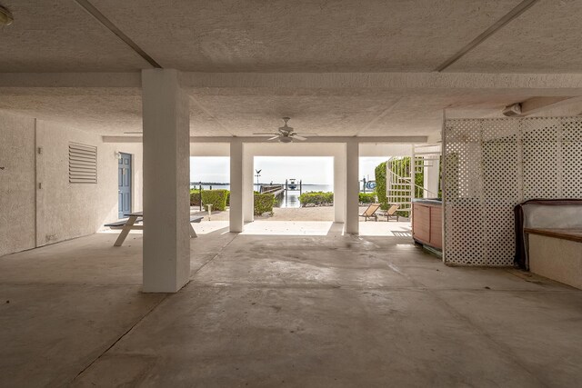 view of patio featuring ceiling fan