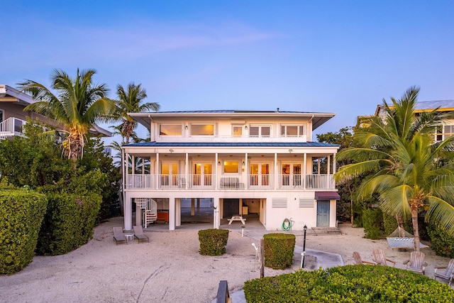 back of property featuring a patio