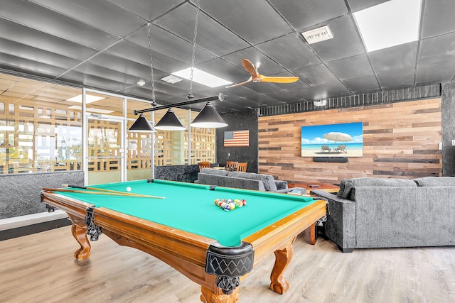 rec room featuring ceiling fan, wooden walls, pool table, wood finished floors, and visible vents