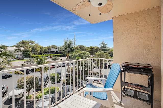 balcony featuring a ceiling fan