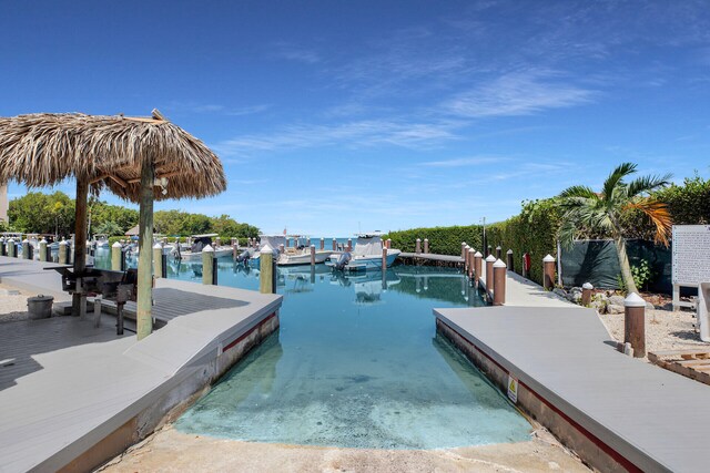 view of dock with a water view