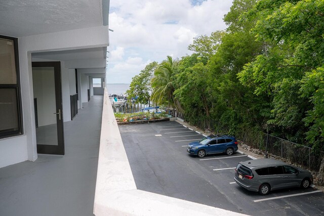 104350 Overseas Hwy Unit B205, Key Largo, FL 33037 - uncovered parking lot with a water view