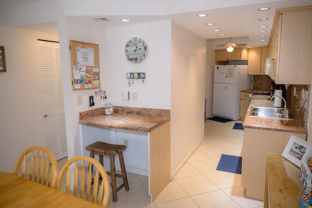104350 Overseas Hwy Unit B205, Key Largo, FL 33037 - kitchen with white appliances, ceiling fan, light tile patterned flooring, recessed lighting, and light brown cabinetry