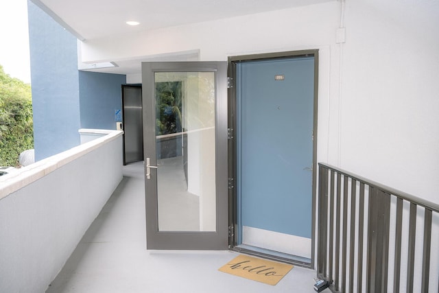 104350 Overseas Hwy Unit B205, Key Largo, FL 33037 - entrance to property with a balcony and stucco siding