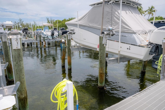 104350 Overseas Hwy Unit B205, Key Largo, FL 33037 - dock featuring boat lift and a water view