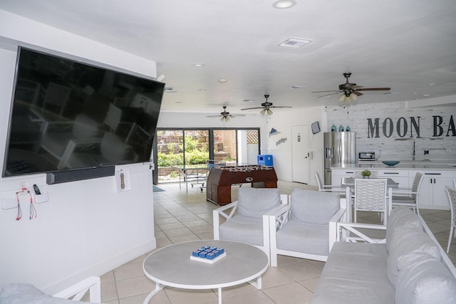104350 Overseas Hwy Unit B205, Key Largo, FL 33037 - living room featuring light tile patterned floors, recessed lighting, and ceiling fan