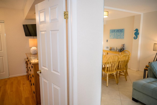 104350 Overseas Hwy Unit B205, Key Largo, FL 33037 - corridor with baseboards and light tile patterned floors