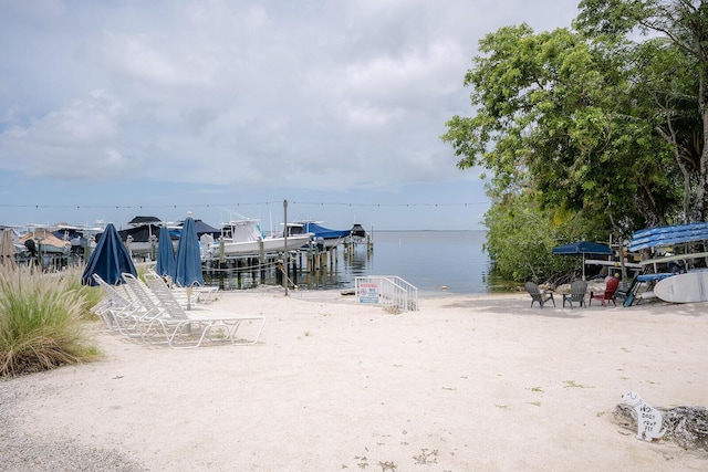 104350 Overseas Hwy Unit B205, Key Largo, FL 33037 - view of yard with a water view, a boat dock, and boat lift
