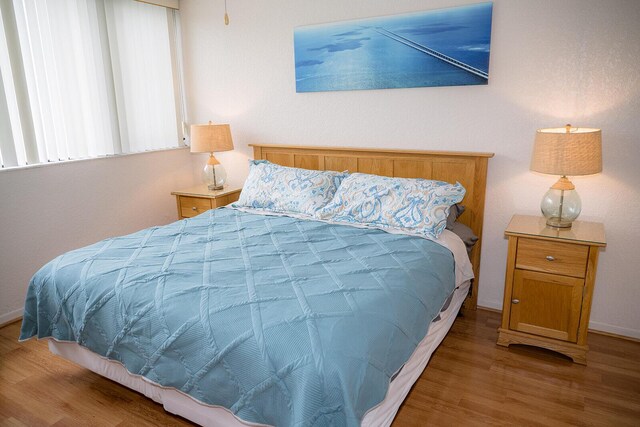 104350 Overseas Hwy Unit B205, Key Largo, FL 33037 - bedroom with wood finished floors
