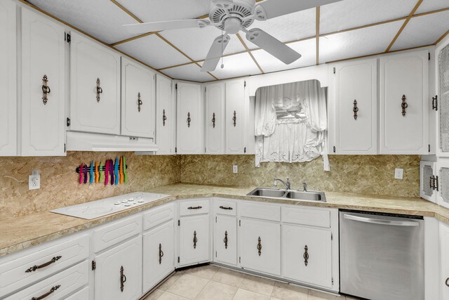 115 Primrose Ln, Long Key, FL 33001 - kitchen featuring ceiling fan, under cabinet range hood, white electric cooktop, stainless steel dishwasher, and a sink