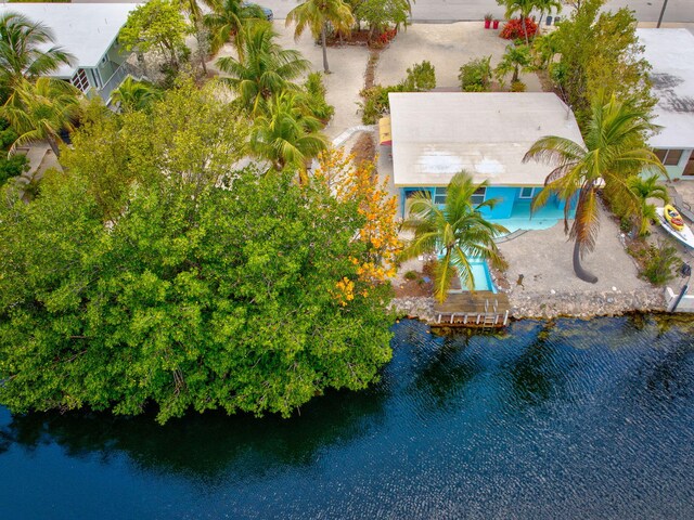 140 Gardenia St, Tavernier, FL 33070 - aerial view of property and surrounding area featuring a nearby body of water and a pool area