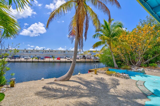 140 Gardenia St, Tavernier, FL 33070 - water view featuring a boat dock