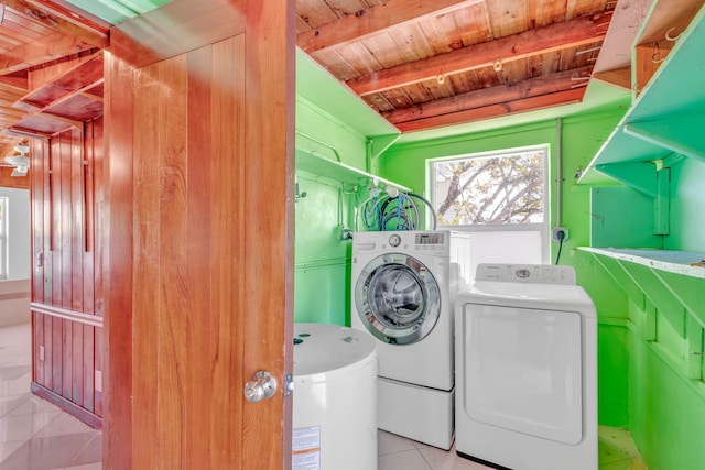 140 Gardenia St, Tavernier, FL 33070 - laundry area with wood ceiling, independent washer and dryer, and tile patterned flooring