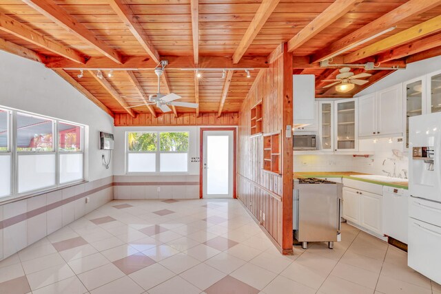 140 Gardenia St, Tavernier, FL 33070 - kitchen featuring a ceiling fan, white appliances, wooden ceiling, a sink, and white cabinets