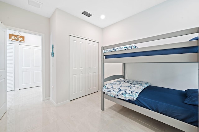 94825 Overseas Hwy Unit 185, Key Largo, FL 33037 - bedroom featuring a closet and light tile patterned flooring